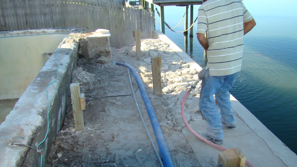 DEMO TILE, KOOL DECK, GUNITE at EXISTING POOL